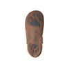 Brown leather sole with paw print design on a white background